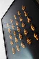 25 goude oesters ingelijst